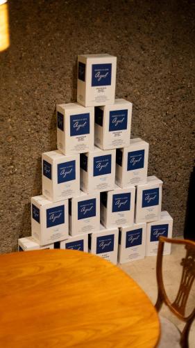 a pile of boxes stacked on top of a table at Casa de Huéspedes La Azul in Los Árboles