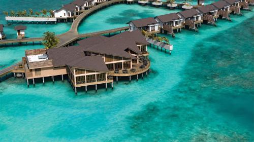 an aerial view of a resort in the water at Atmosphere Kanifushi - Premium All Inclusive with Free Transfers in Lhaviyani Atoll