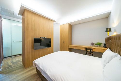 Μια τηλεόραση ή/και κέντρο ψυχαγωγίας στο B&B near the seaside