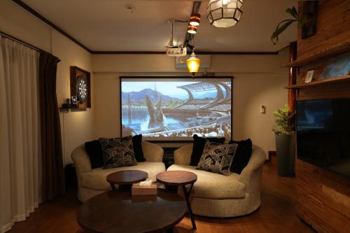 Posezení v ubytování Cinema Resorts 3