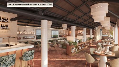 a rendering of a restaurant with tables and chairs at Inmood San Roque in Sotogrande