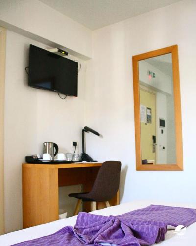 Postel nebo postele na pokoji v ubytování Hotel Belvedere Mindelo, Cabo Verde