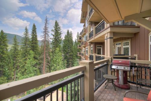 a balcony with a view of the mountains at Timbers & Lone Eagle by Vail Resorts in Keystone