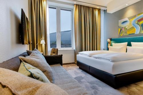 เตียงในห้องที่ Motel One Wiesbaden