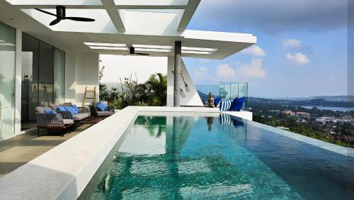 a swimming pool in a villa with a view at Golden Lotus Villas in Chaweng