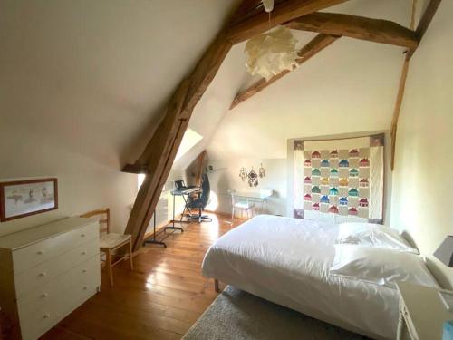 Кровать или кровати в номере La maison du quai - Sauna et Hot tub