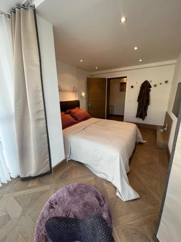 Postel nebo postele na pokoji v ubytování Exclusive Comfy Apartment in Central Crans-Montana
