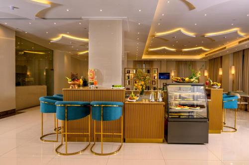 En restaurang eller annat matställe på Paradise Nice Hotel Jeddah