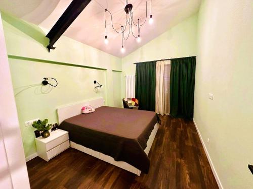 a bedroom with a bed in a room with green walls at Ski Dreams Cottage in Bakuriani *4 Bedroom in Bakuriani