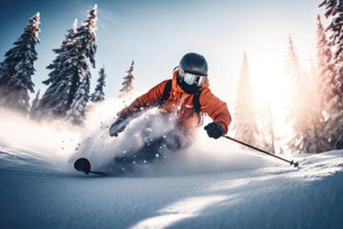 a person is skiing down a snow covered slope at Hunderfossen Hotel & Resort in Hafjell