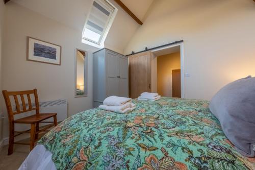 Ένα ή περισσότερα κρεβάτια σε δωμάτιο στο The Old Bunkhouse