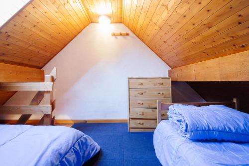 Ένα ή περισσότερα κρεβάτια σε δωμάτιο στο Appartement 5 pers