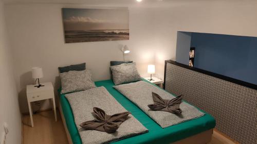 Postel nebo postele na pokoji v ubytování Super Central Apartment