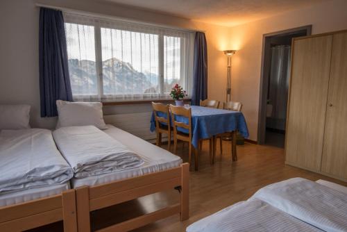 Postel nebo postele na pokoji v ubytování Hotel Restaurant Bergheim
