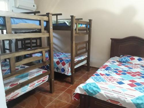 Krevet ili kreveti na kat u jedinici u objektu Cabaña Ecoturistica la Bonita