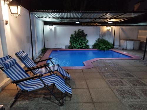 Bazén v ubytování Costanera Bed & Breakfast nebo v jeho okolí
