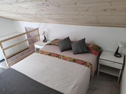 Postel nebo postele na pokoji v ubytování Team019 Casa Giusi 4 ospiti Catania