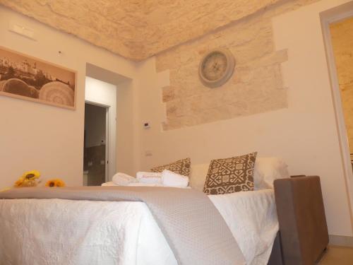 Postel nebo postele na pokoji v ubytování Trullo Manivida