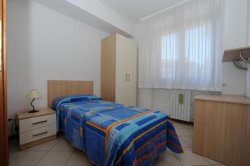 Ліжко або ліжка в номері Residence Sole del Conero