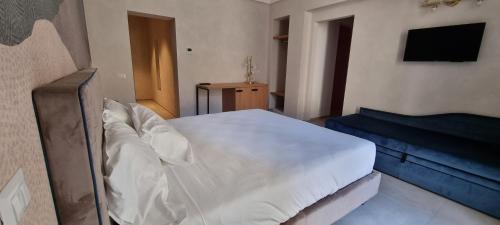 Postel nebo postele na pokoji v ubytování B&B Apartments Palazzo del corso