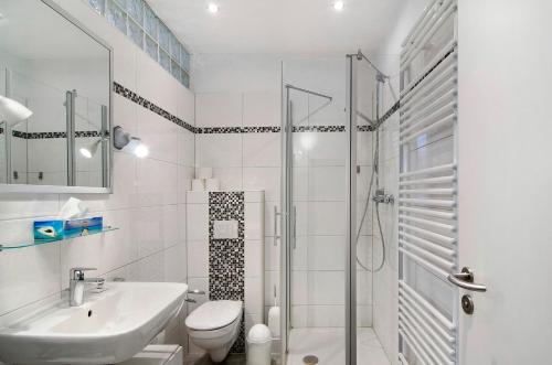 Ένα μπάνιο στο Hiddes Hus - Ferienwohnung Fuhrmann