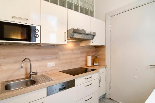 Η κουζίνα ή μικρή κουζίνα στο Hiddes Hus - Ferienwohnung Fuhrmann