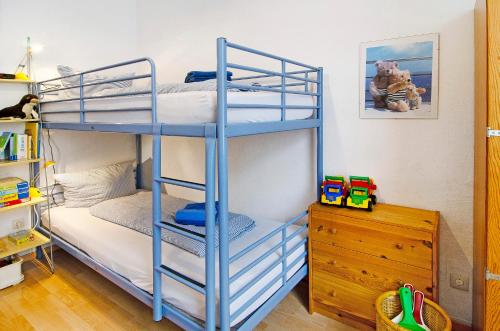 Ένα ή περισσότερα κρεβάτια σε δωμάτιο στο Hiddes Hus - Ferienwohnung Fuhrmann