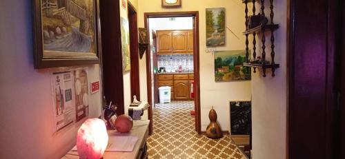 a hallway of a home with a room with a hallway at Alojamento local Os Maias in Mirandela