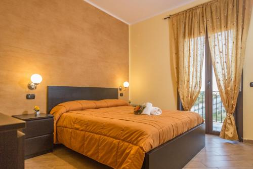Postel nebo postele na pokoji v ubytování B&B Monte (Montemare)