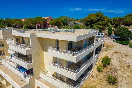 an aerial view of a building with balconies at Residence A Marina in Lumio