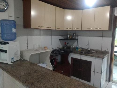 Virtuvė arba virtuvėlė apgyvendinimo įstaigoje Casa Praia NAVEGANTES GRAVATÁ