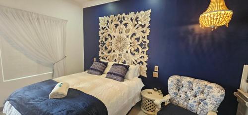 Un pat sau paturi într-o cameră la Grazia Luxury Overnight accommodation
