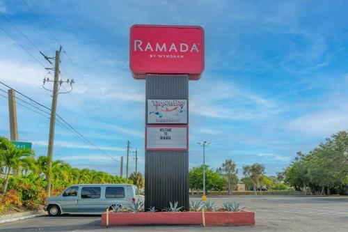 a sign for a rammadiartment at Heated Pool, Strong WI-FI, TV, Tiki Bar & Grill! in Sarasota
