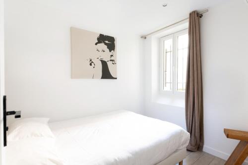Postel nebo postele na pokoji v ubytování Central Apartment in the heart of the Marais
