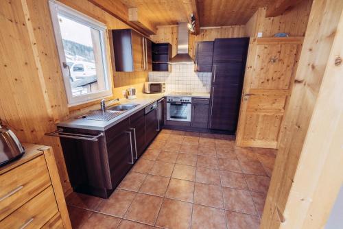 Una cocina o zona de cocina en Woody Park