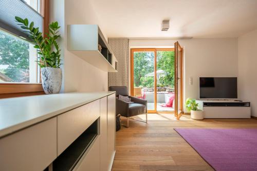 TV a/nebo společenská místnost v ubytování Ferienhaus am Park