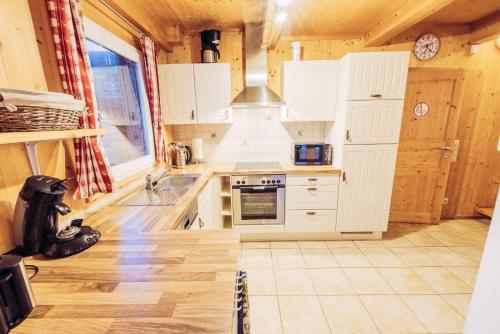 Una cocina o zona de cocina en Woody Park