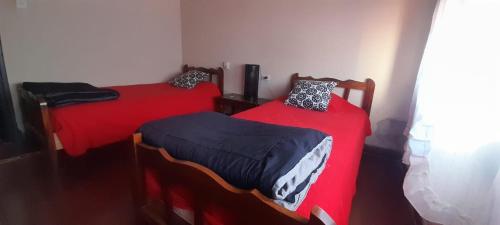 Katil atau katil-katil dalam bilik di Casa Huésped Shalom