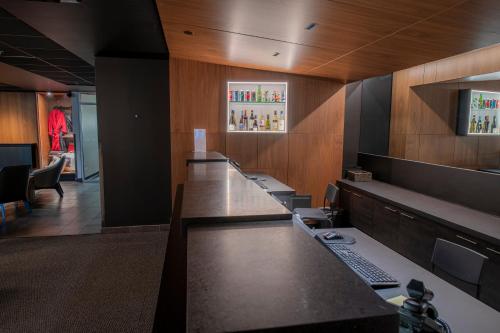 El área de trabajo o centro de convenciones de Grand Times Hotel – Aeroport de Quebec