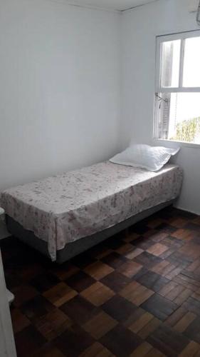 Кровать или кровати в номере Casa da Lourdes 2 quartos