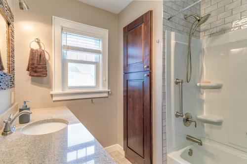 A bathroom at Quaint Howells Retreat - Steps from Main Street!