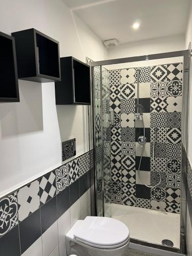 a bathroom with a toilet and a shower at Giuseppe & Greta in Bari