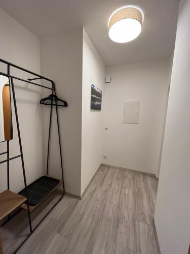 an empty room with a treadmill in the corner of a room at FeWo HansUndChrista in Mariapfarr