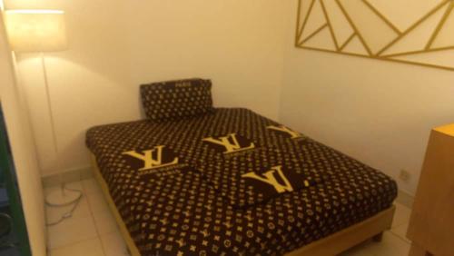 Ein Bett oder Betten in einem Zimmer der Unterkunft Appartement EMISYD