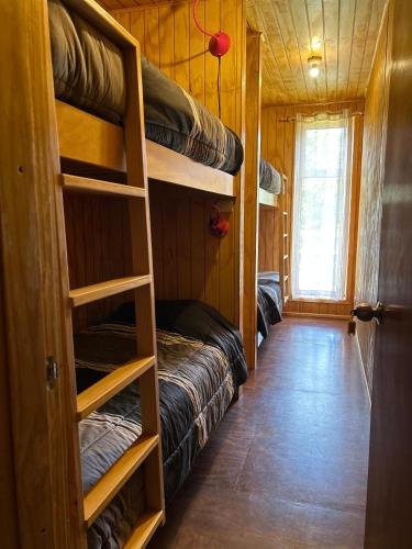 Palanda nebo palandy na pokoji v ubytování QUELEN PATAGONIA