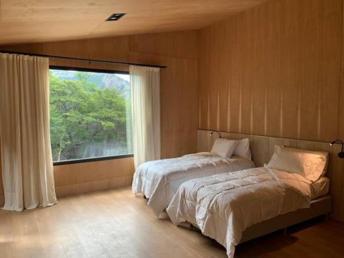 alquilar casa negra en El Chaltén