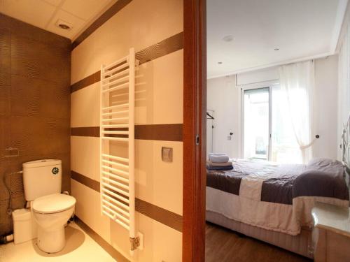 Ένα ή περισσότερα κρεβάτια σε δωμάτιο στο Bed and Breakfast en Salou