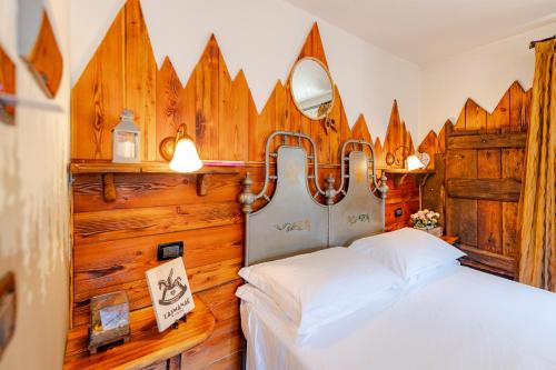 Postel nebo postele na pokoji v ubytování Hotel&Restaurant Armanac de Toubïe