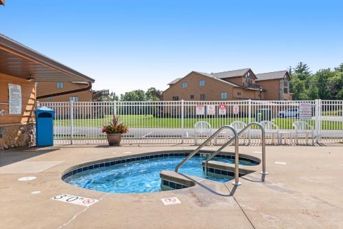 a small swimming pool with a slide in a yard at Tigers Den - Lower in Arkdale