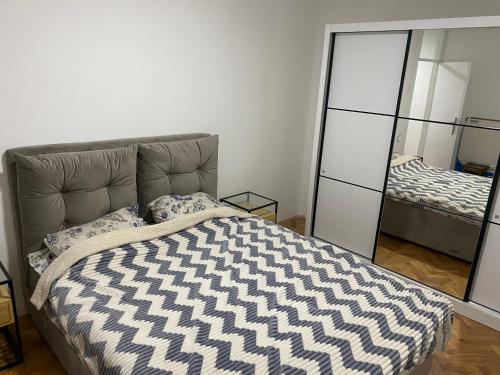 Кровать или кровати в номере Regal Comfort Apartment